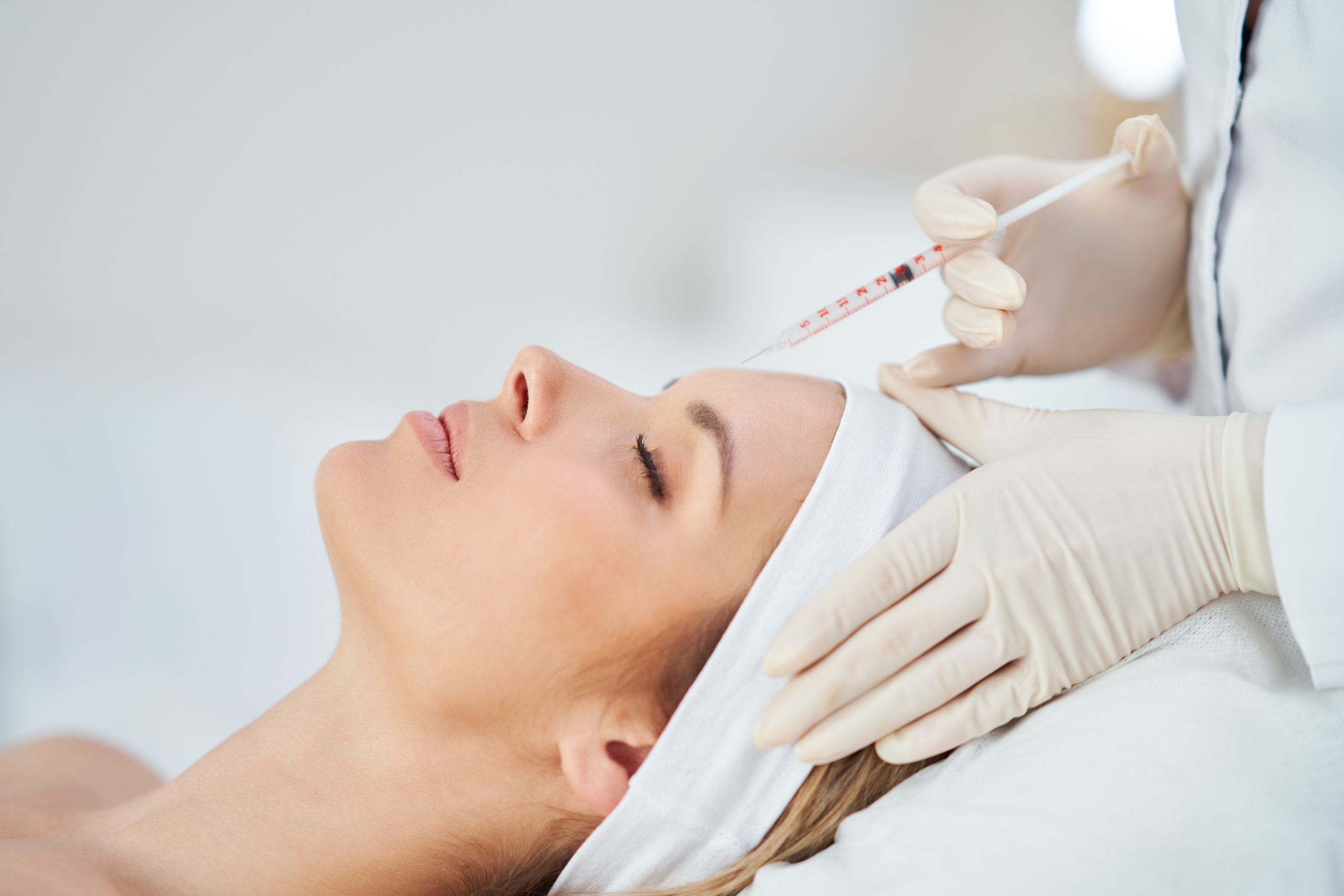 Physician administering a Botox injection