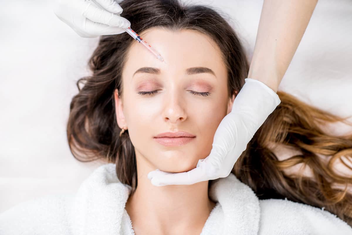 Neuromodulator injection near the eyebrow